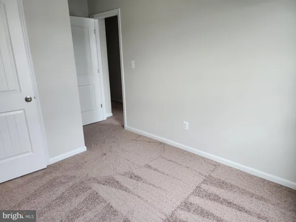 a view of front of a house with a garden