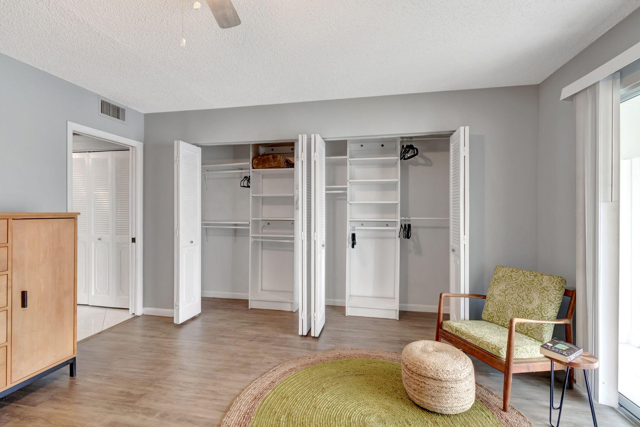 3031 Cornwall East Boca Raton, FL 33434 - Photo 23 of 84 a living room with furniture and a wooden floor