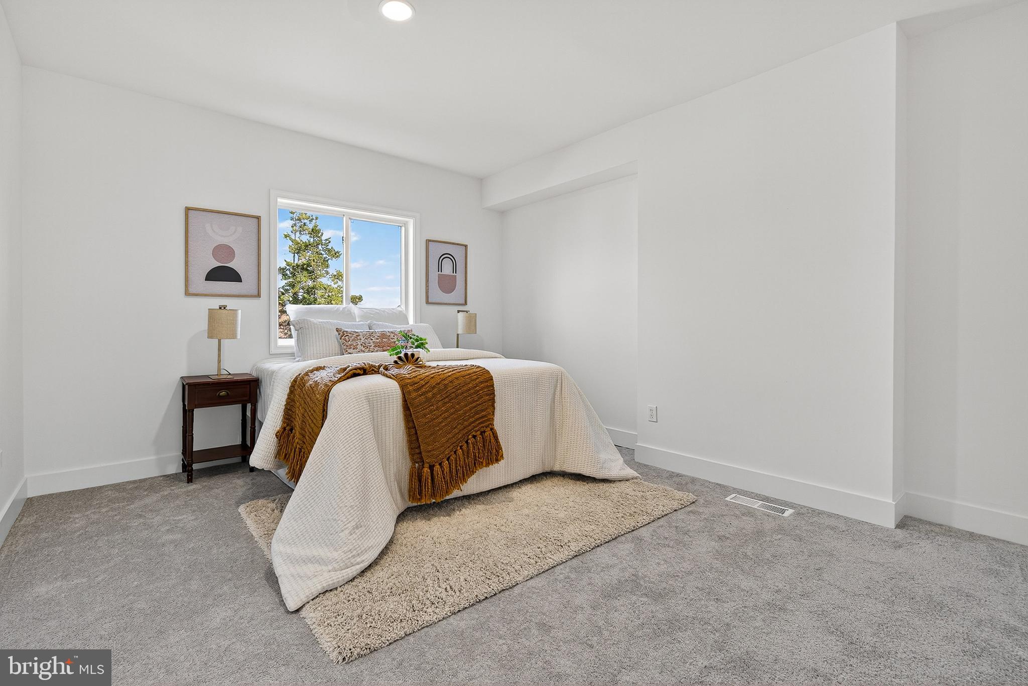 802 North Woodington Road Baltimore, MD 21229 - Photo 13 of 41 a bedroom with a bed and a desk