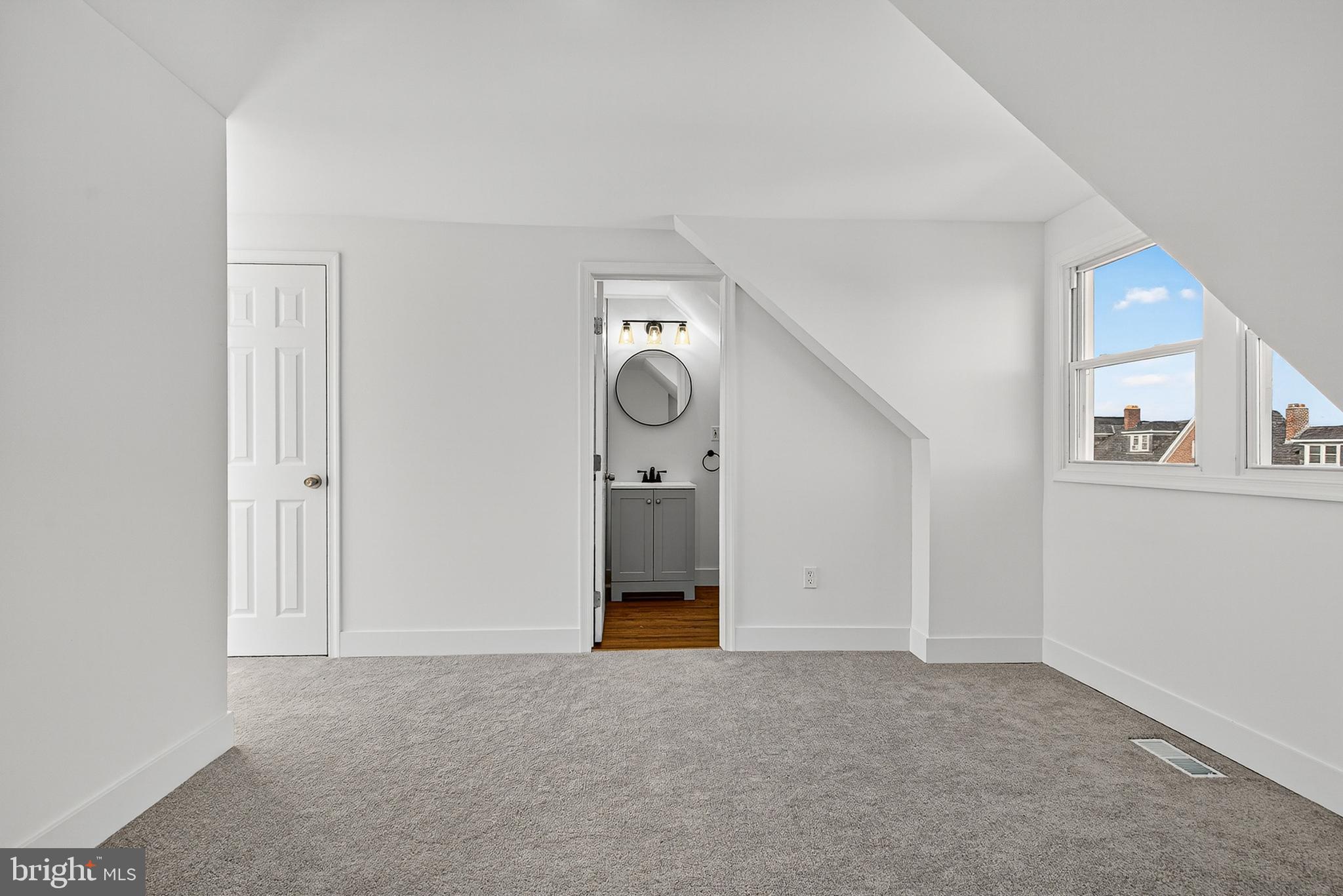 802 North Woodington Road Baltimore, MD 21229 - Photo 27 of 41 a view of empty room with cabinet and painted walls