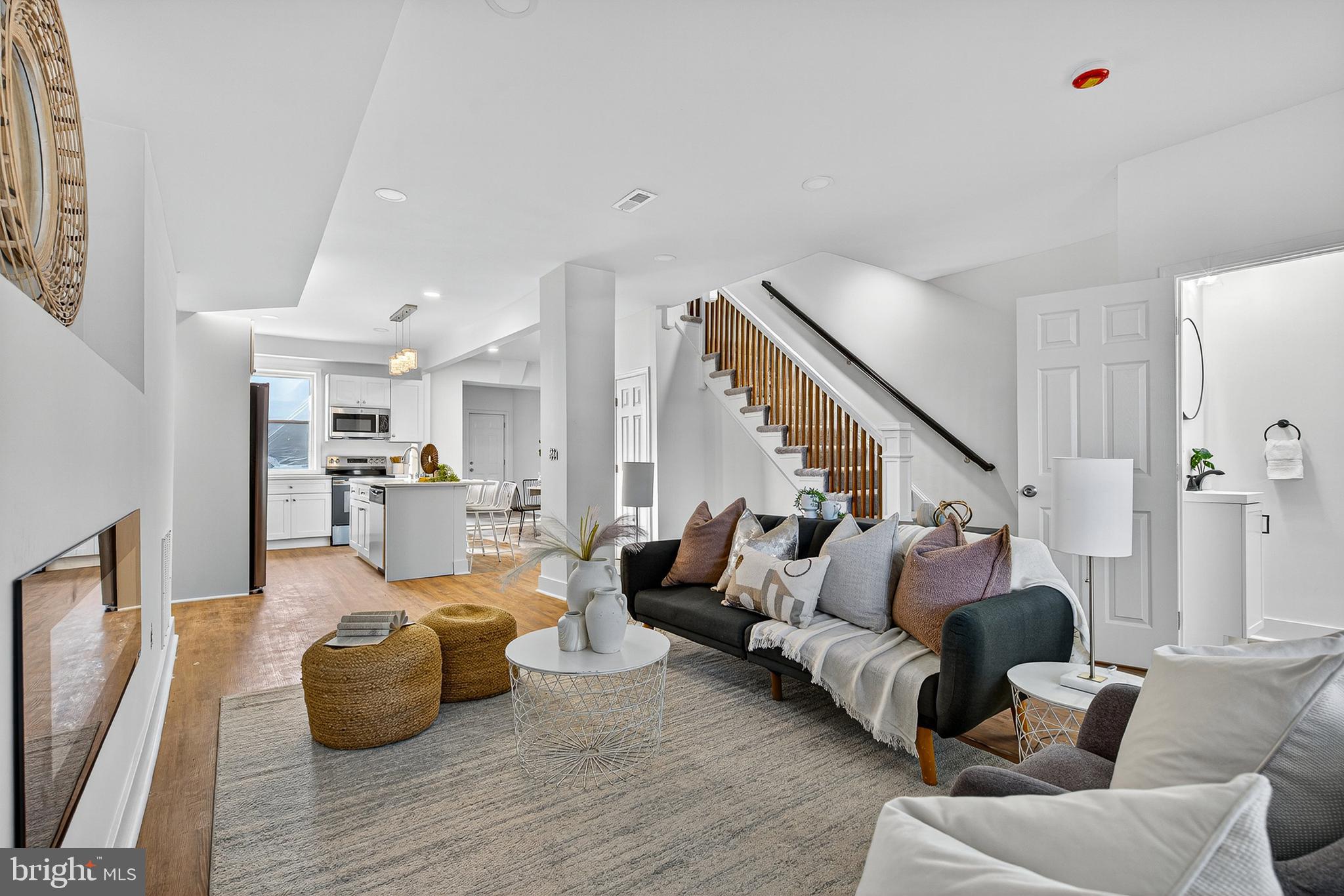 802 North Woodington Road Baltimore, MD 21229 - Photo 4 of 41 a living room with furniture and a wooden floor
