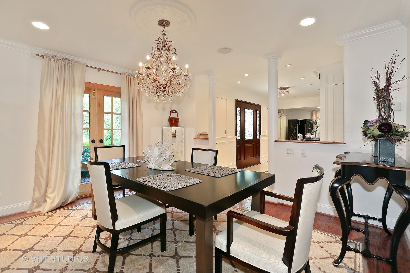 39 Mockingbird Lane Oak Brook, IL 60523 - Photo 14 of 45 a view of a dining room with furniture and a chandelier