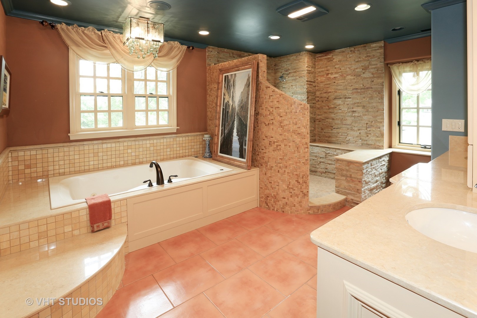 39 Mockingbird Lane Oak Brook, IL 60523 - Photo 19 of 45 a bathroom with a tub sink and mirror