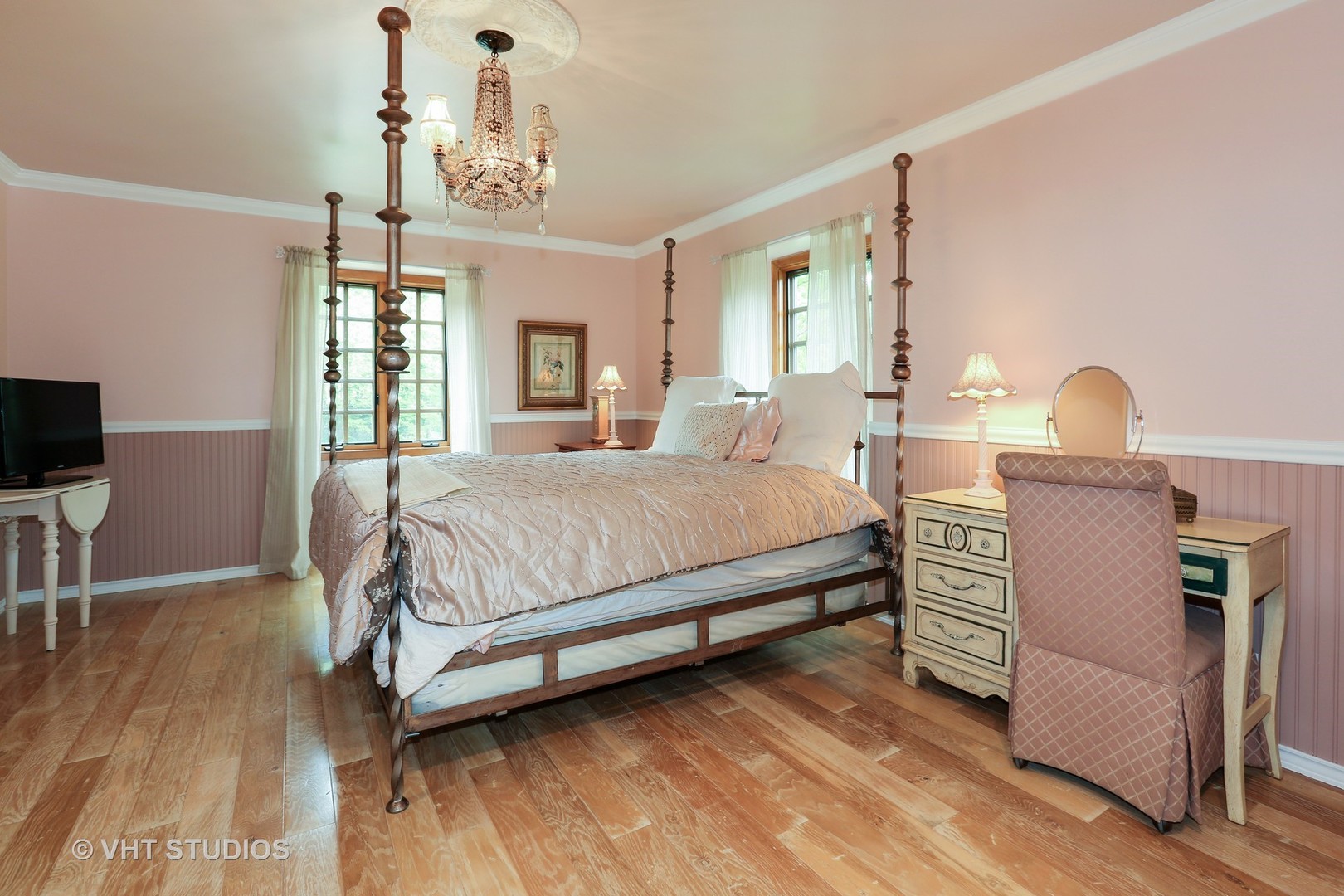 39 Mockingbird Lane Oak Brook, IL 60523 - Photo 21 of 45 a bedroom with a bed wooden floor and window