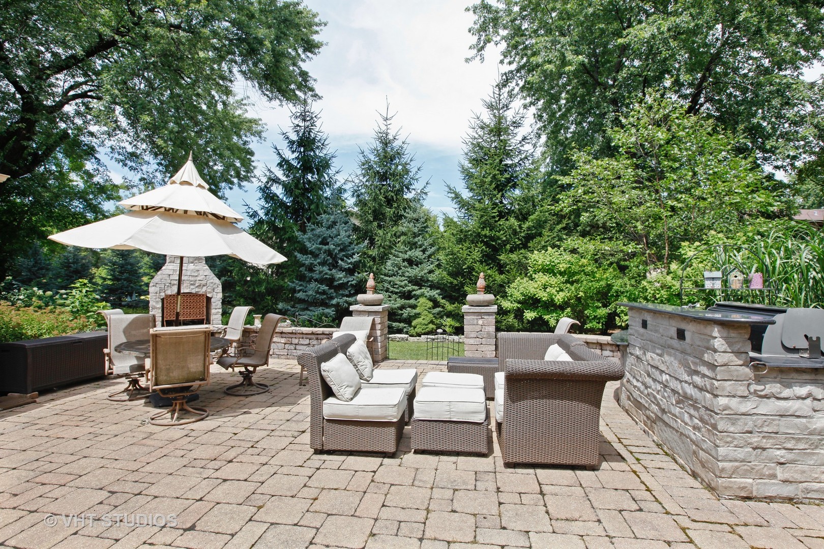 39 Mockingbird Lane Oak Brook, IL 60523 - Photo 23 of 45 a view of backyard of house with seating space
