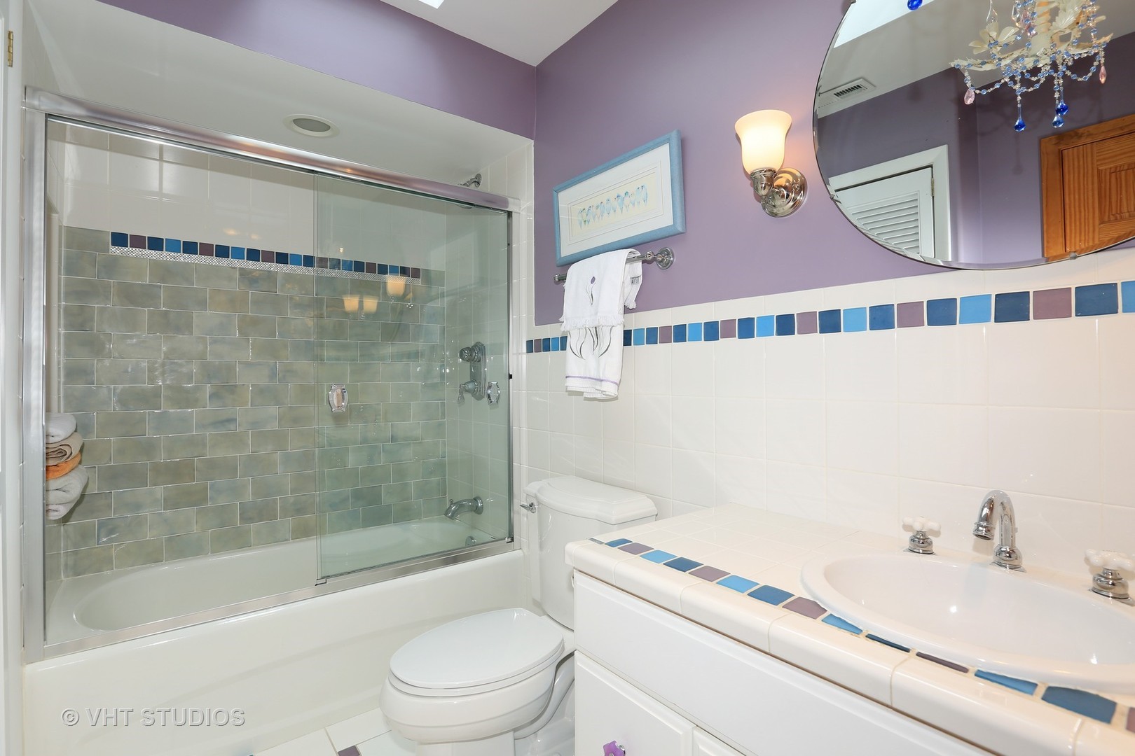 39 Mockingbird Lane Oak Brook, IL 60523 - Photo 30 of 45 a bathroom with a bathtub shower sink vanity and toilet