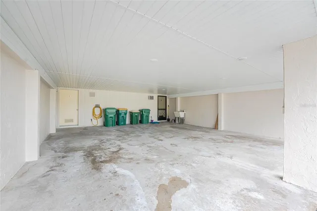 a view of a house with a yard and porch