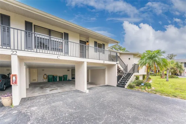 a view of house with a swimming pool