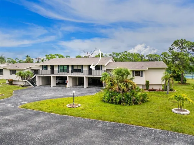 a view of a house with swimming pool