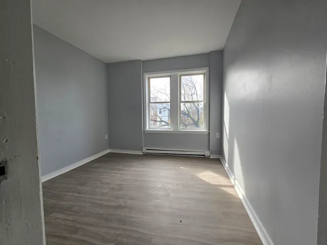 an empty room with window