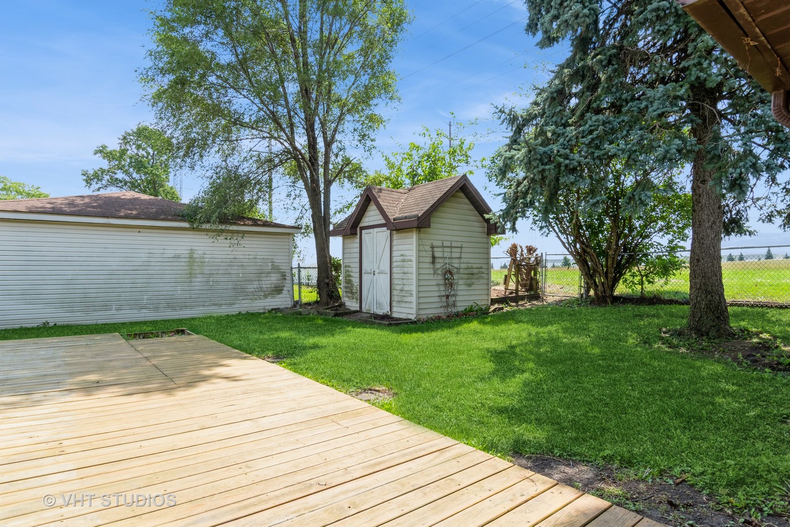 809 Oakton Avenue Romeoville, IL 60446 - Photo 20 of 23 a view of a house with a yard