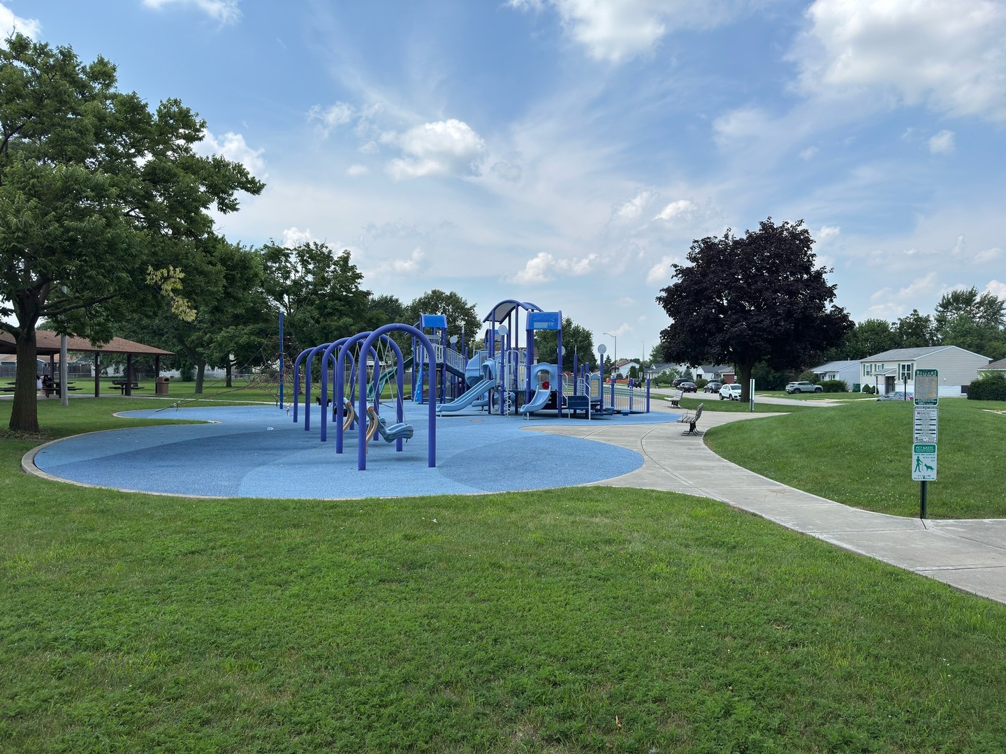 809 Oakton Avenue Romeoville, IL 60446 - Photo 22 of 23 a view of a park with swings and slides