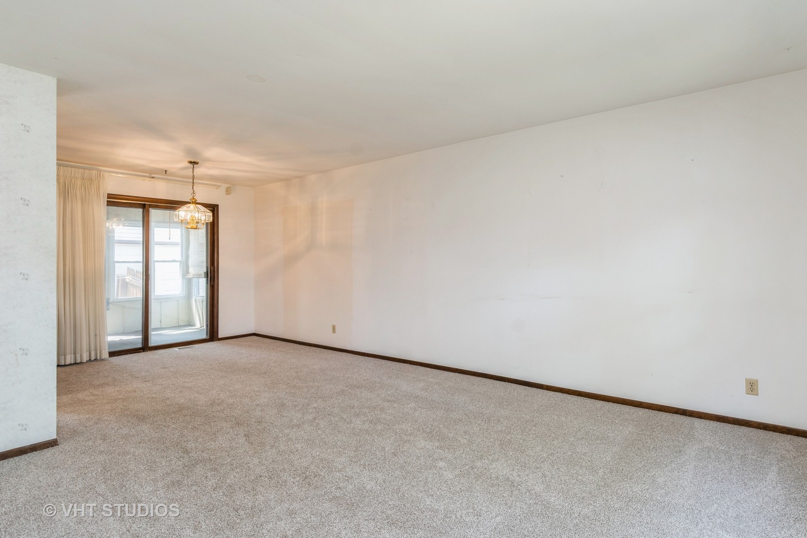 809 Oakton Avenue Romeoville, IL 60446 - Photo 3 of 23 a view of an empty room and window