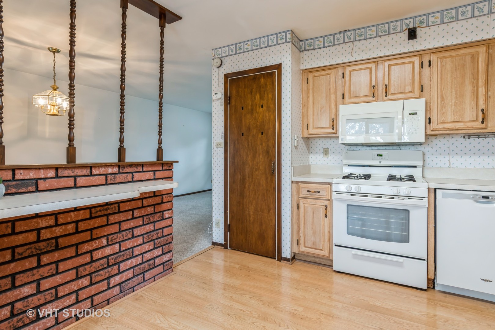809 Oakton Avenue Romeoville, IL 60446 - Photo 5 of 23 a kitchen with stainless steel appliances a stove and a refrigerator