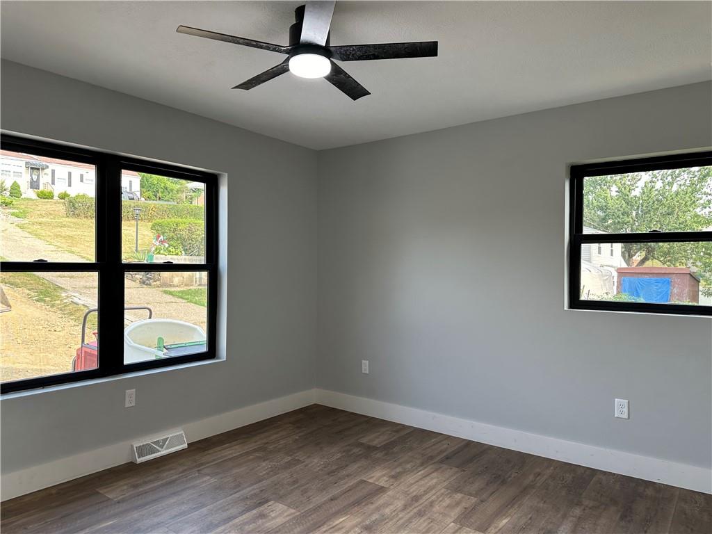 121 Hillview Road Jefferson Hills, PA 15025 - Photo 13 of 42 wooden floor in an empty room with a window