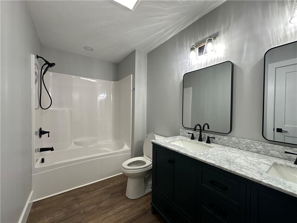 121 Hillview Road Jefferson Hills, PA 15025 - Photo 17 of 42 a bathroom with a double vanity sink toilet mirror and shower