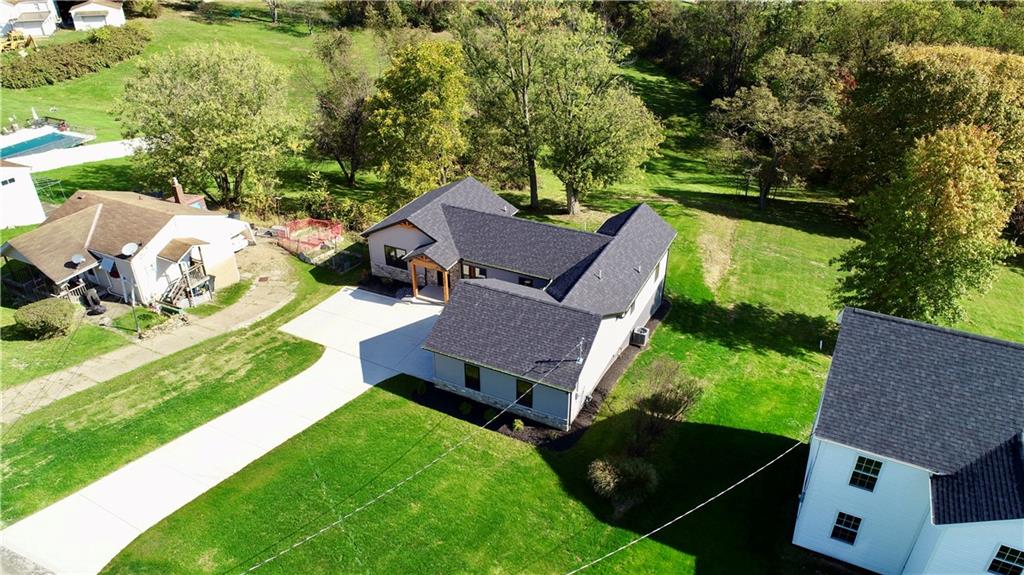 121 Hillview Road Jefferson Hills, PA 15025 - Photo 31 of 42 an aerial view of a house with a garden and trees