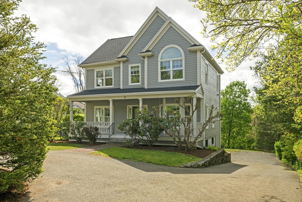 38 Lincoln Street Lexington, MA 02421 - Photo 1 of 38 a front view of a house with garden