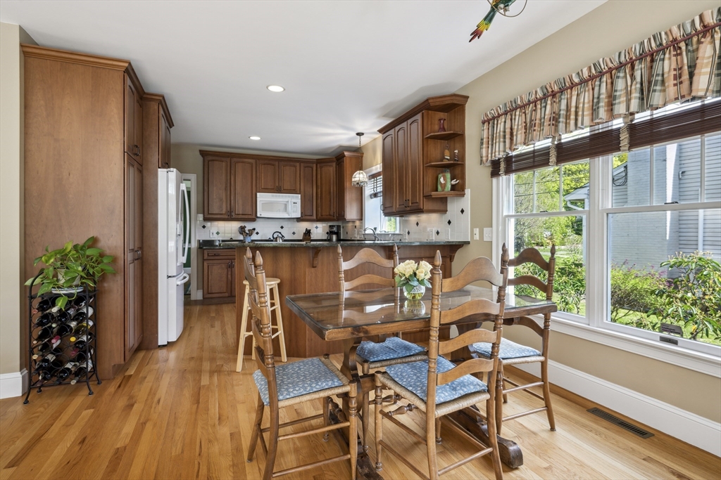 38 Lincoln Street Lexington, MA 02421 - Photo 11 of 38 a view of a dining room with furniture window and wooden floor