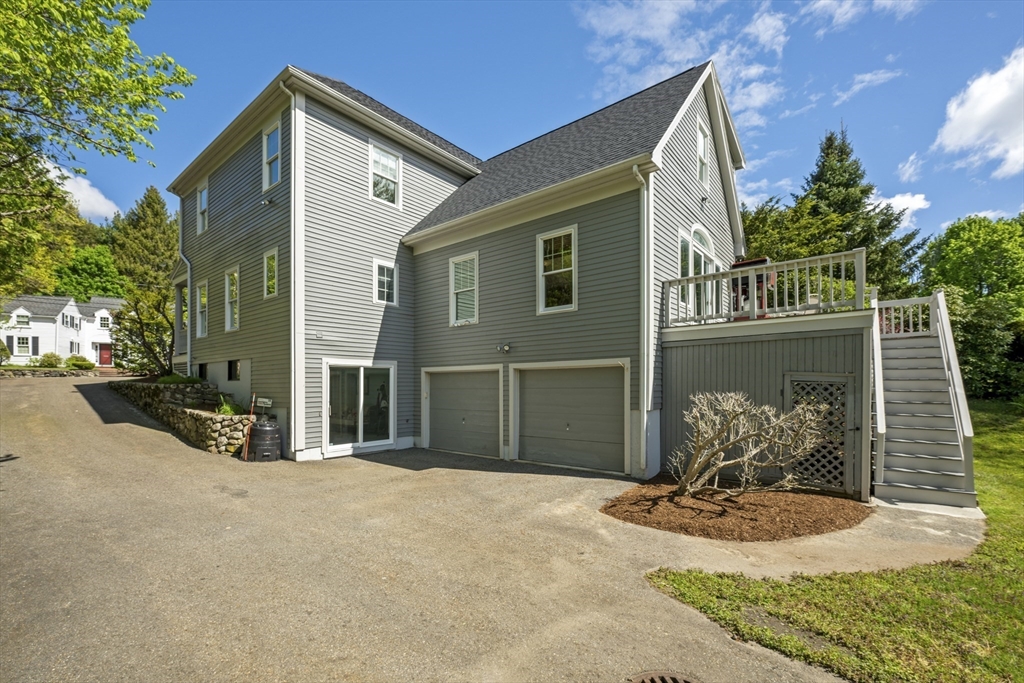 38 Lincoln Street Lexington, MA 02421 - Photo 29 of 38 a front view of a house with garden