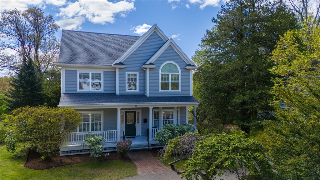 38 Lincoln Street Lexington, MA 02421 - Photo 38 of 38 a front view of a house with a yard