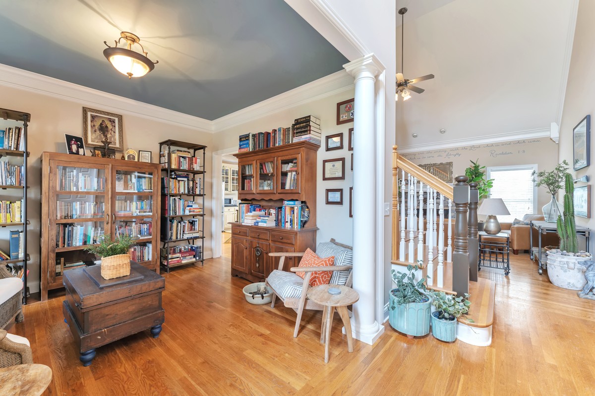 457 Bowling Branch Road Cottontown, TN 37048 - Photo 11 of 38 a living room with furniture and a book shelf