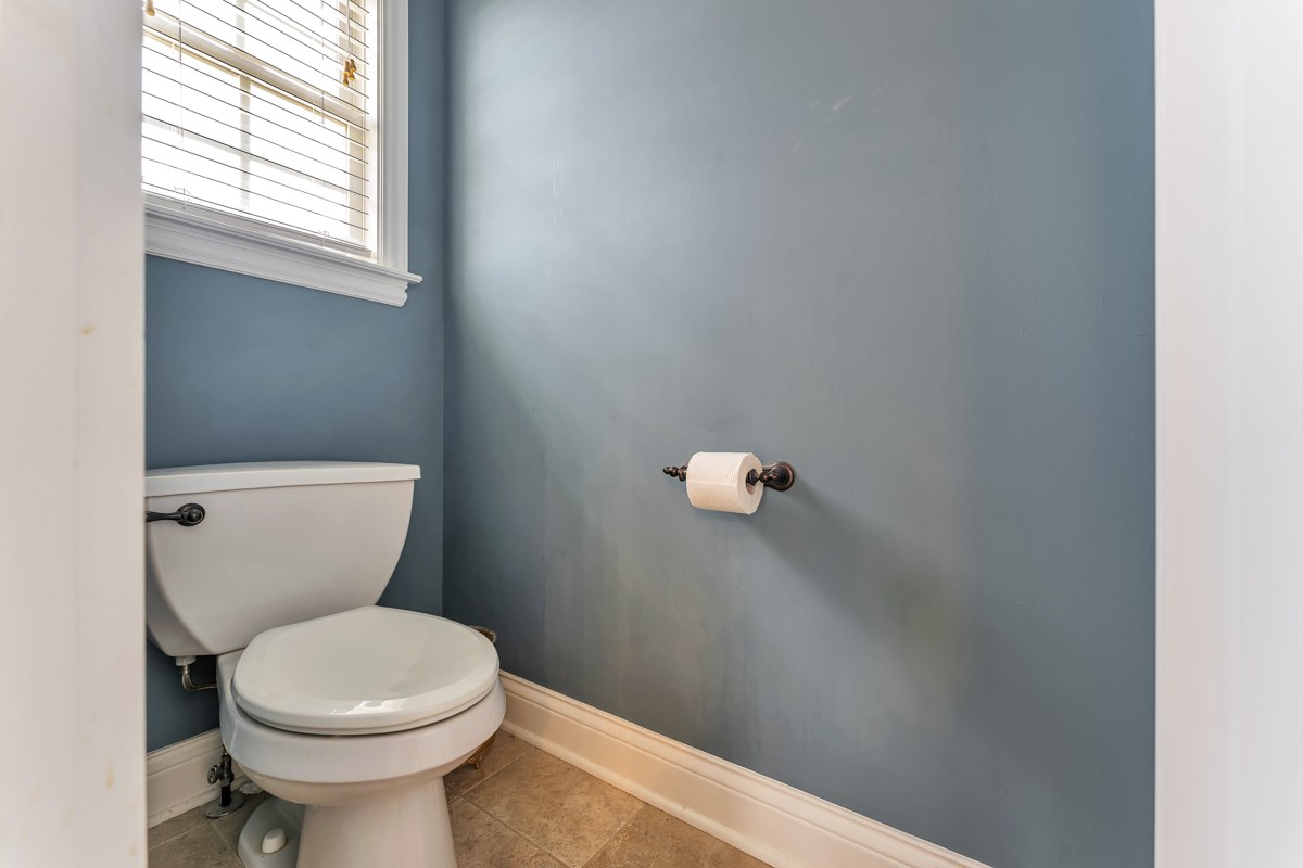 457 Bowling Branch Road Cottontown, TN 37048 - Photo 19 of 38 a bathroom with a toilet and a sink