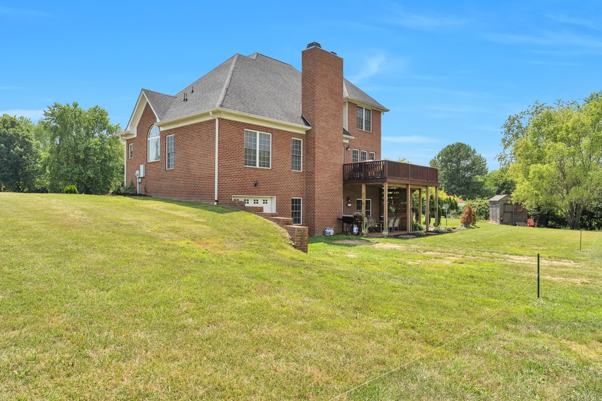 457 Bowling Branch Road Cottontown, TN 37048 - Photo 3 of 38 a front view of a house with a yard