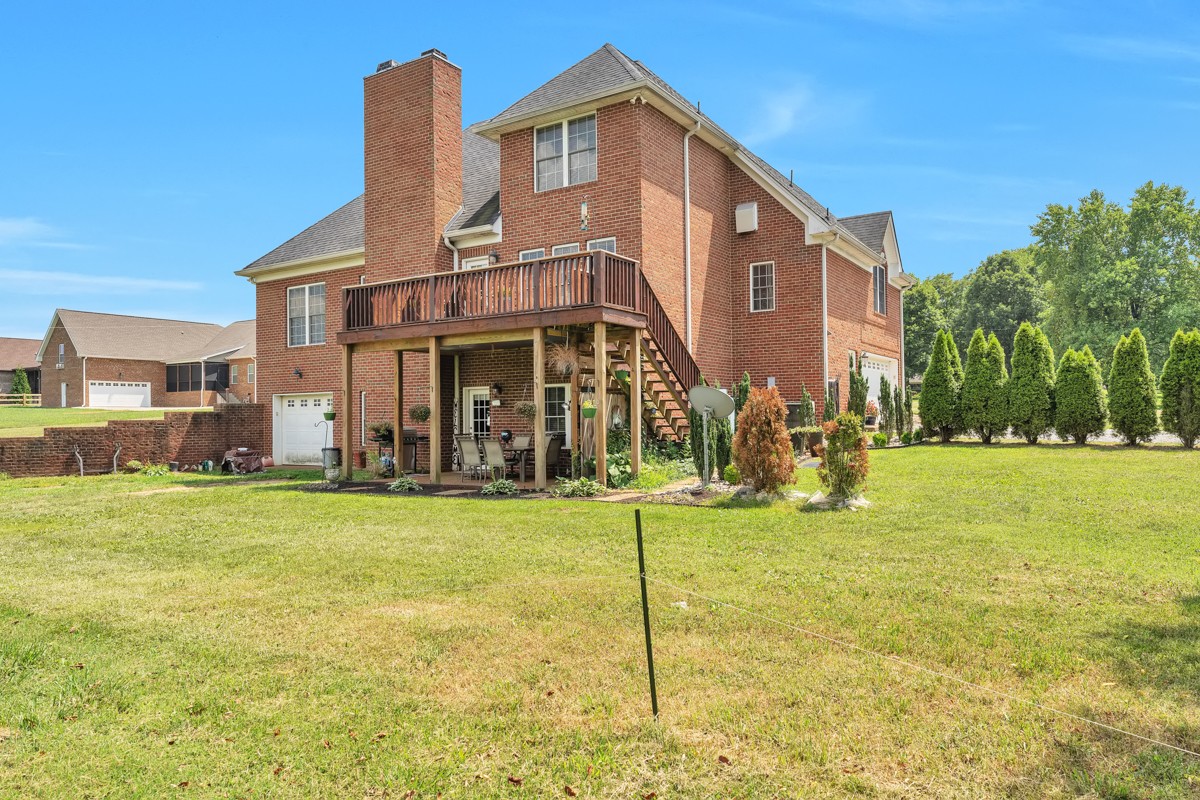 457 Bowling Branch Road Cottontown, TN 37048 - Photo 4 of 38 a view of a house with a yard