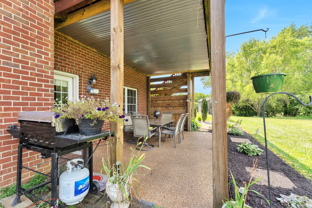 457 Bowling Branch Road Cottontown, TN 37048 - Photo 35 of 38 a view of an outdoor space with seating area
