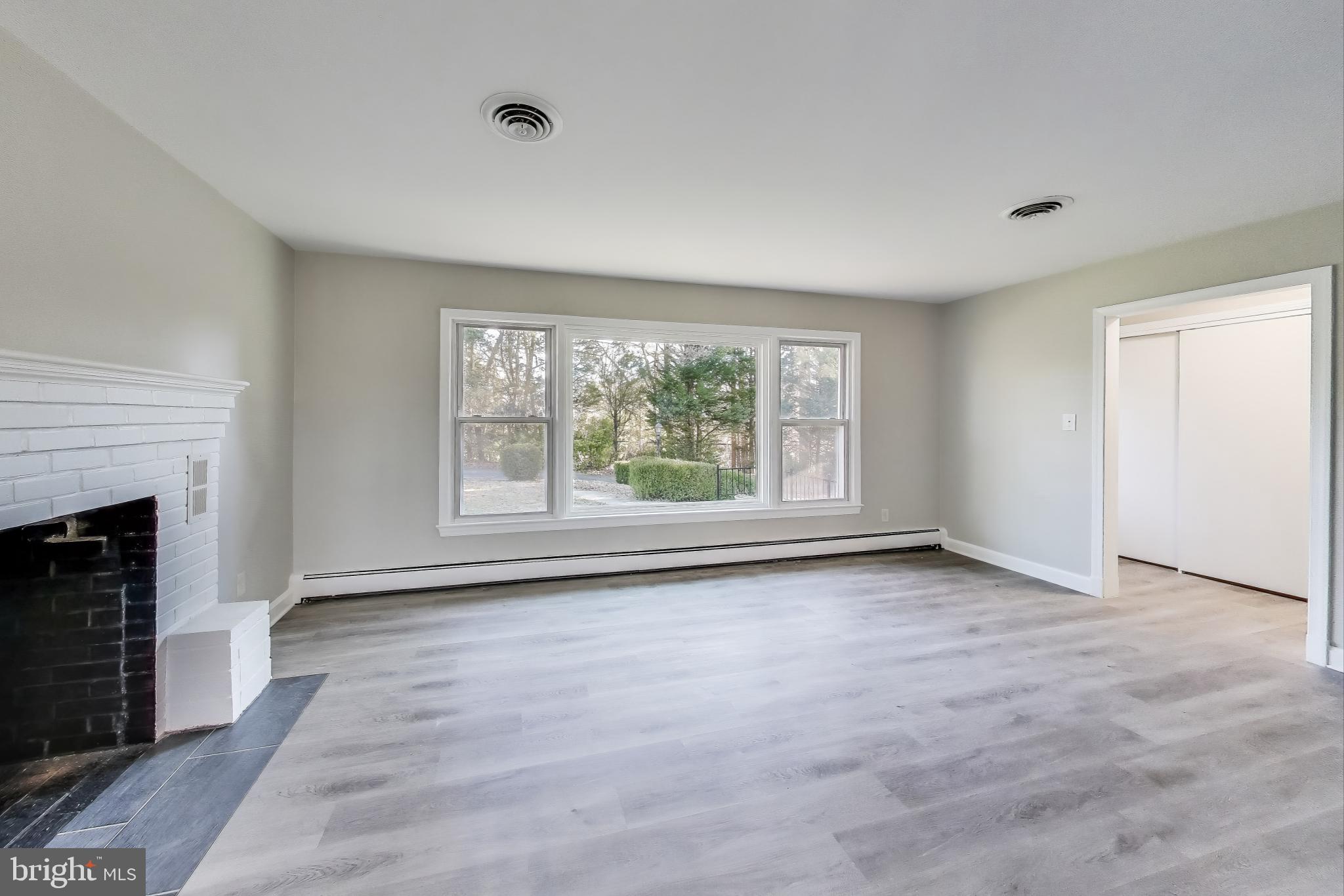 24313 Mervell Dean Road Hollywood, MD 20636 - Photo 13 of 37 Living Room