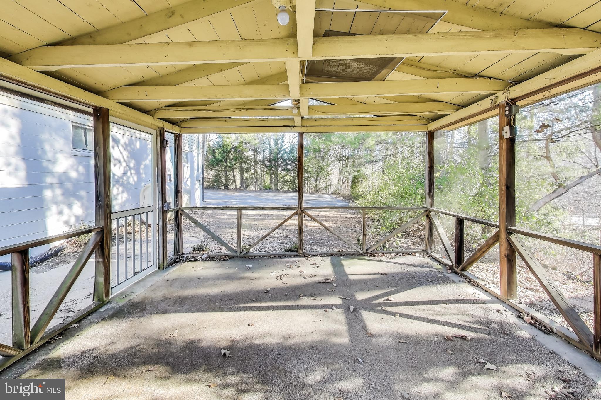 24313 Mervell Dean Road Hollywood, MD 20636 - Photo 34 of 37 Covered Patio