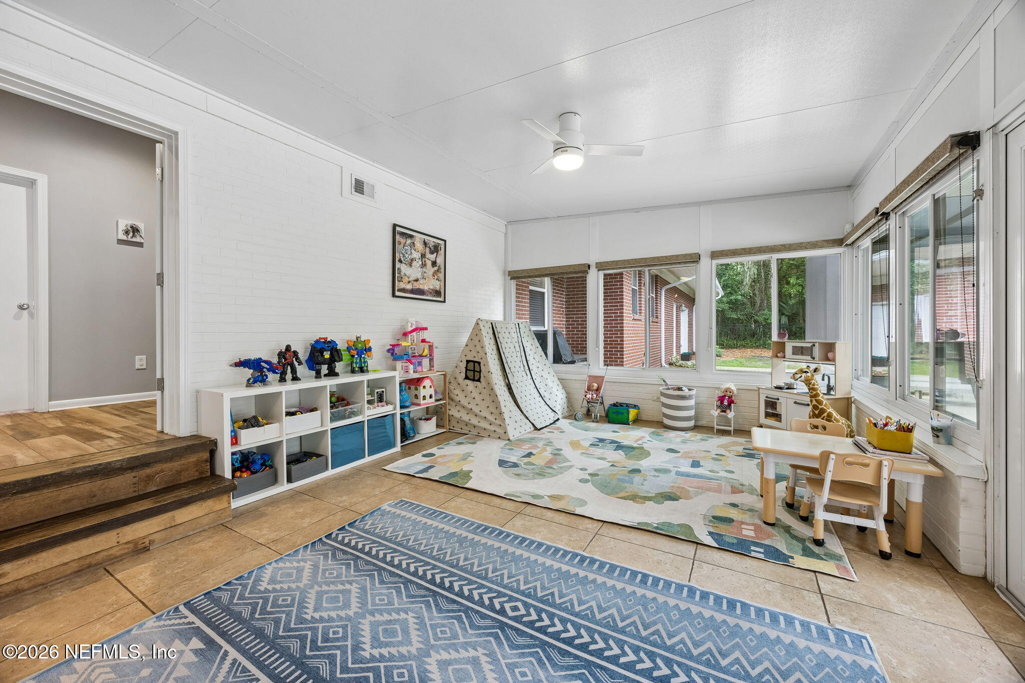 974 Mapleton Terrace Jacksonville, FL 32207 - Photo 19 of 55 Sunroom play area