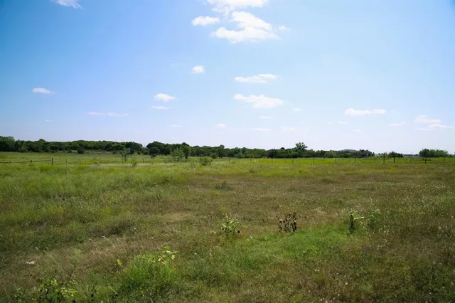 a view of a lake and a yard