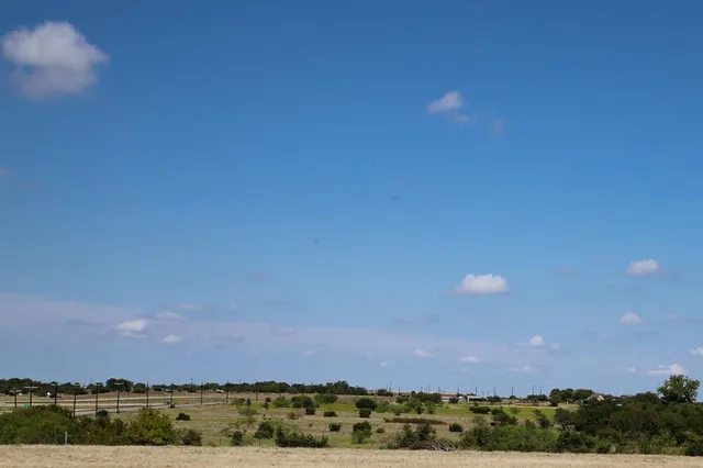 a view of mountain with lake view