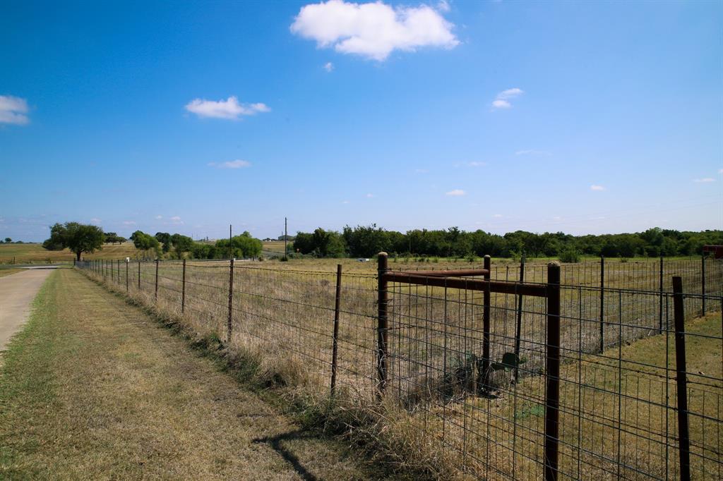 1365 Doty Road Cleburne, TX 76033 - Photo 6 of 26 a view of a lake from a balcony