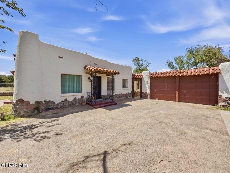 4135 Emory Road El Paso, TX 79922 - Photo 14 of 73 a view of a house with a yard