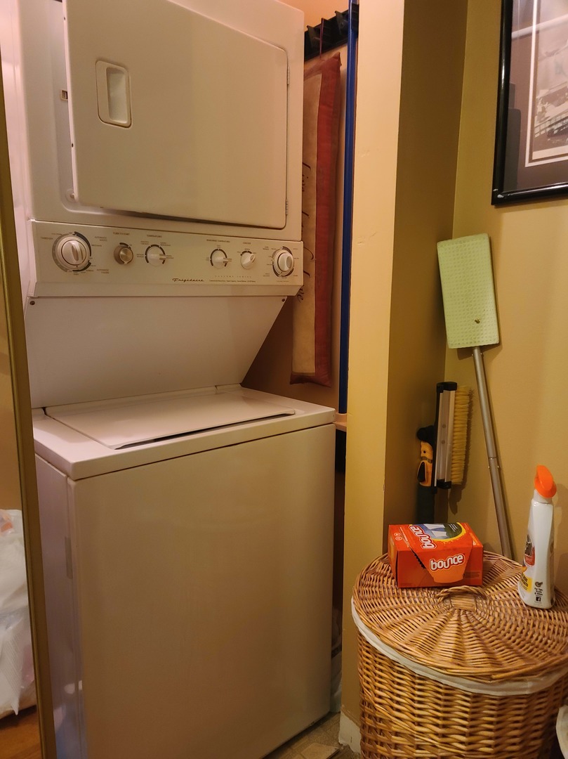 1771 West Algonquin Road, Unit 3B Mount Prospect, IL 60056 - Photo 14 of 17 a bathroom with a sink and mirror