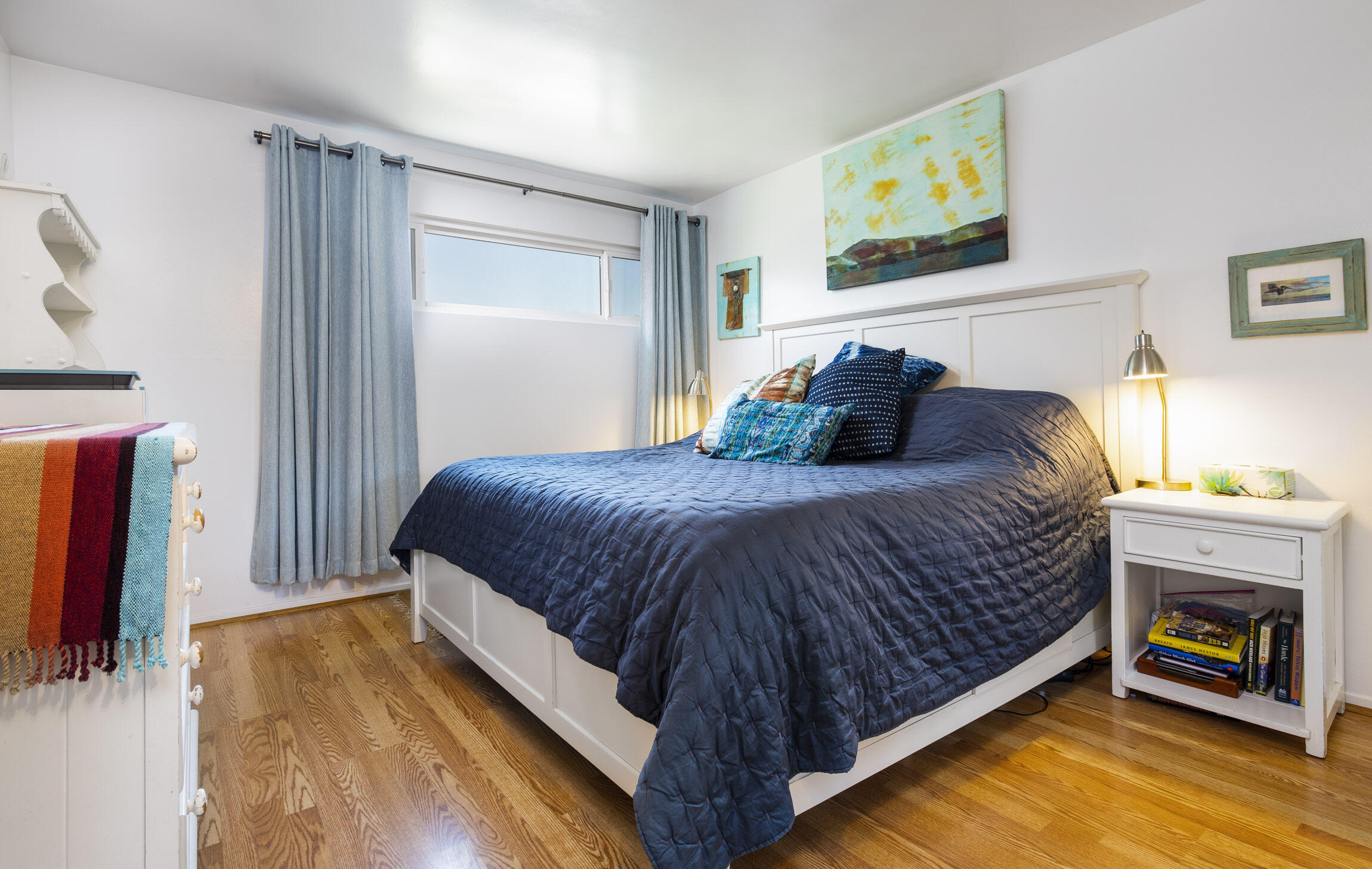 231 Ribera Drive, Unit A Santa Barbara, CA 93111 - Photo 12 of 18 a bedroom with a bed and a fireplace