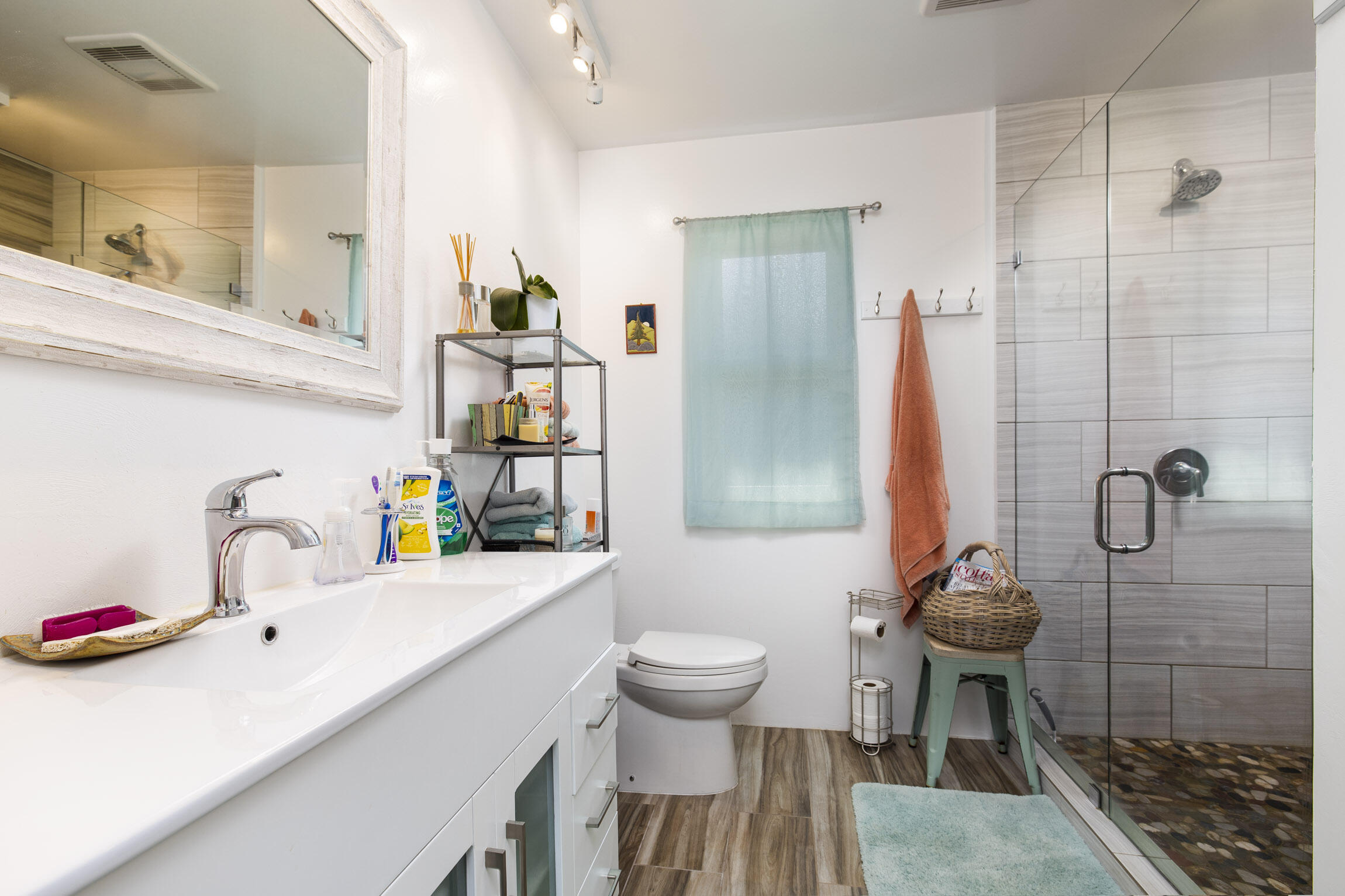 231 Ribera Drive, Unit A Santa Barbara, CA 93111 - Photo 13 of 18 a bathroom with a sink a toilet and shower