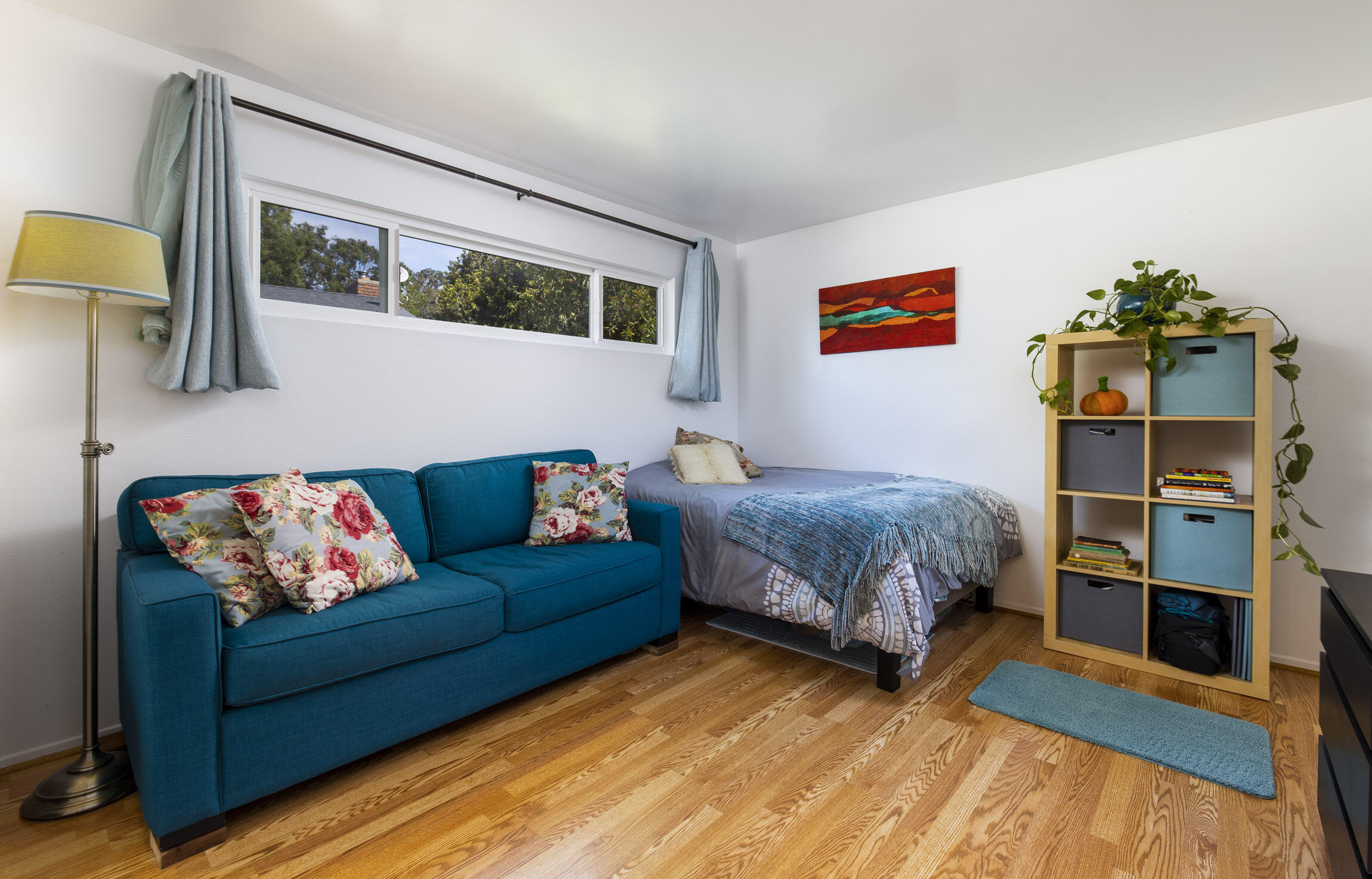 231 Ribera Drive, Unit A Santa Barbara, CA 93111 - Photo 14 of 18 a bedroom with a bed and a couch