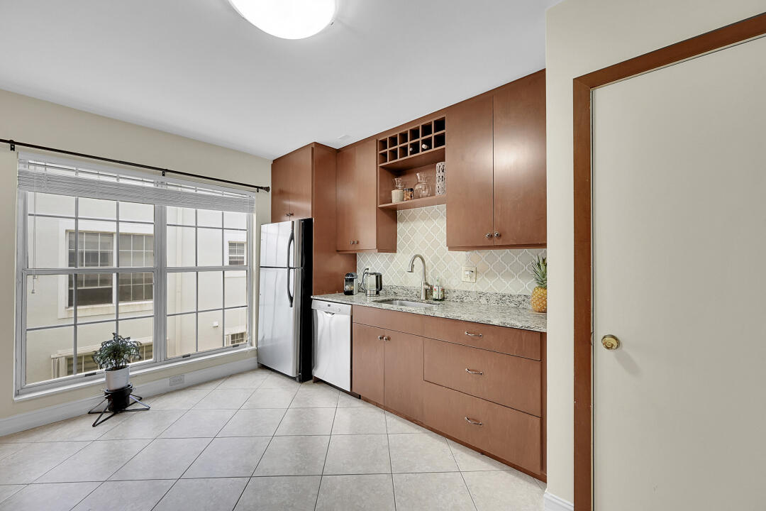 6245 Old Court Road, Unit 202 Boca Raton, FL 33433 - Photo 12 of 41 a spacious bathroom with a granite countertop sink mirror and shower