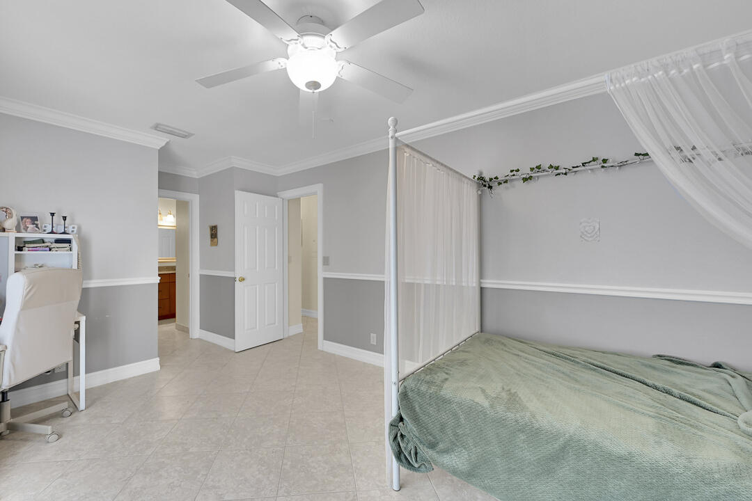 6245 Old Court Road, Unit 202 Boca Raton, FL 33433 - Photo 17 of 41 a view of a livingroom with a furniture and chandelier fan