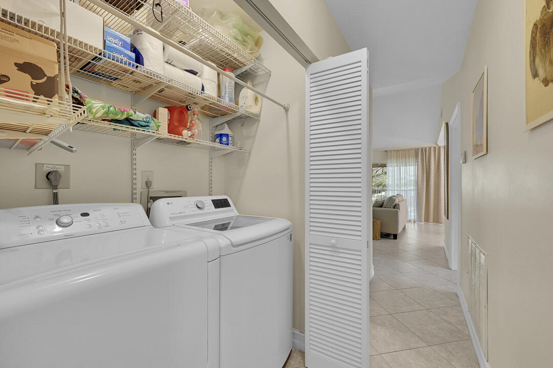 6245 Old Court Road, Unit 202 Boca Raton, FL 33433 - Photo 18 of 41 a utility room with dryer and washer