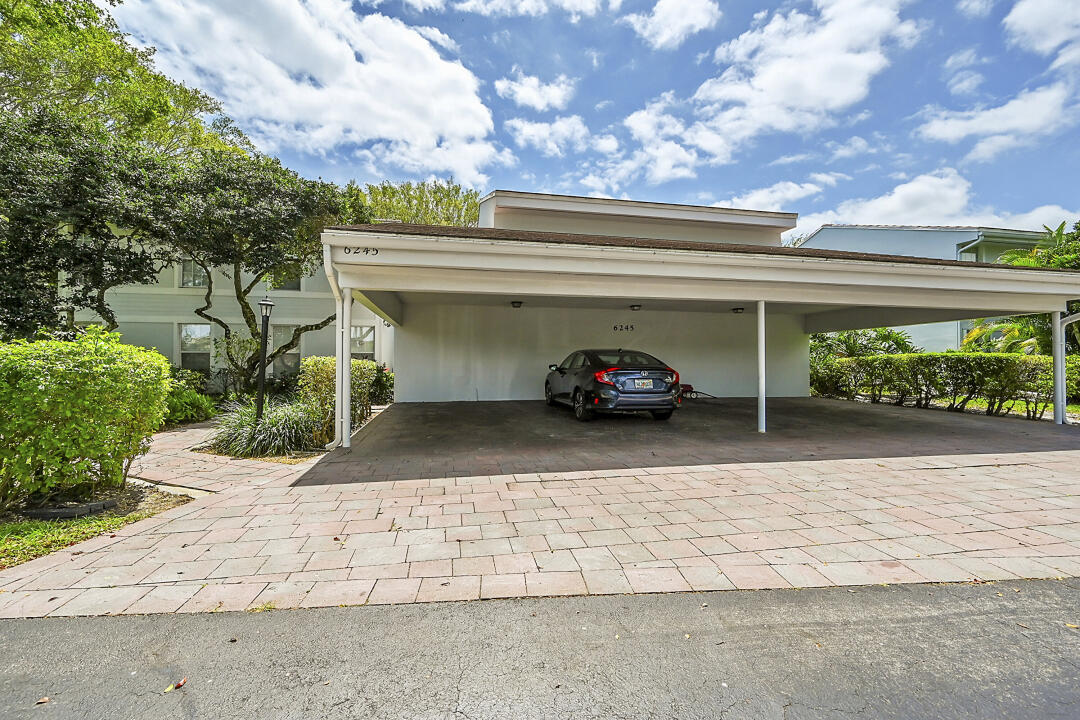 6245 Old Court Road, Unit 202 Boca Raton, FL 33433 - Photo 6 of 41 a car parked on the side of a road