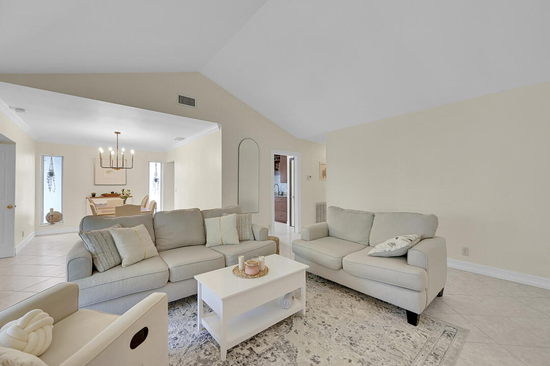 6245 Old Court Road, Unit 202 Boca Raton, FL 33433 - Photo 7 of 41 a living room with furniture and a couch