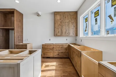 a view of room with window and hardwood