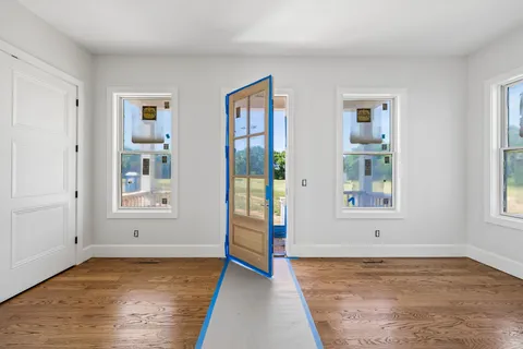 an empty room with windows
