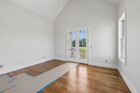 a black and white photo of a living room