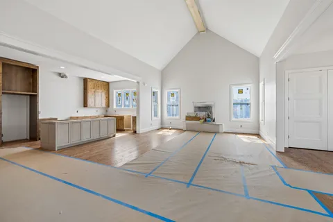 a bed room with a bed and a window